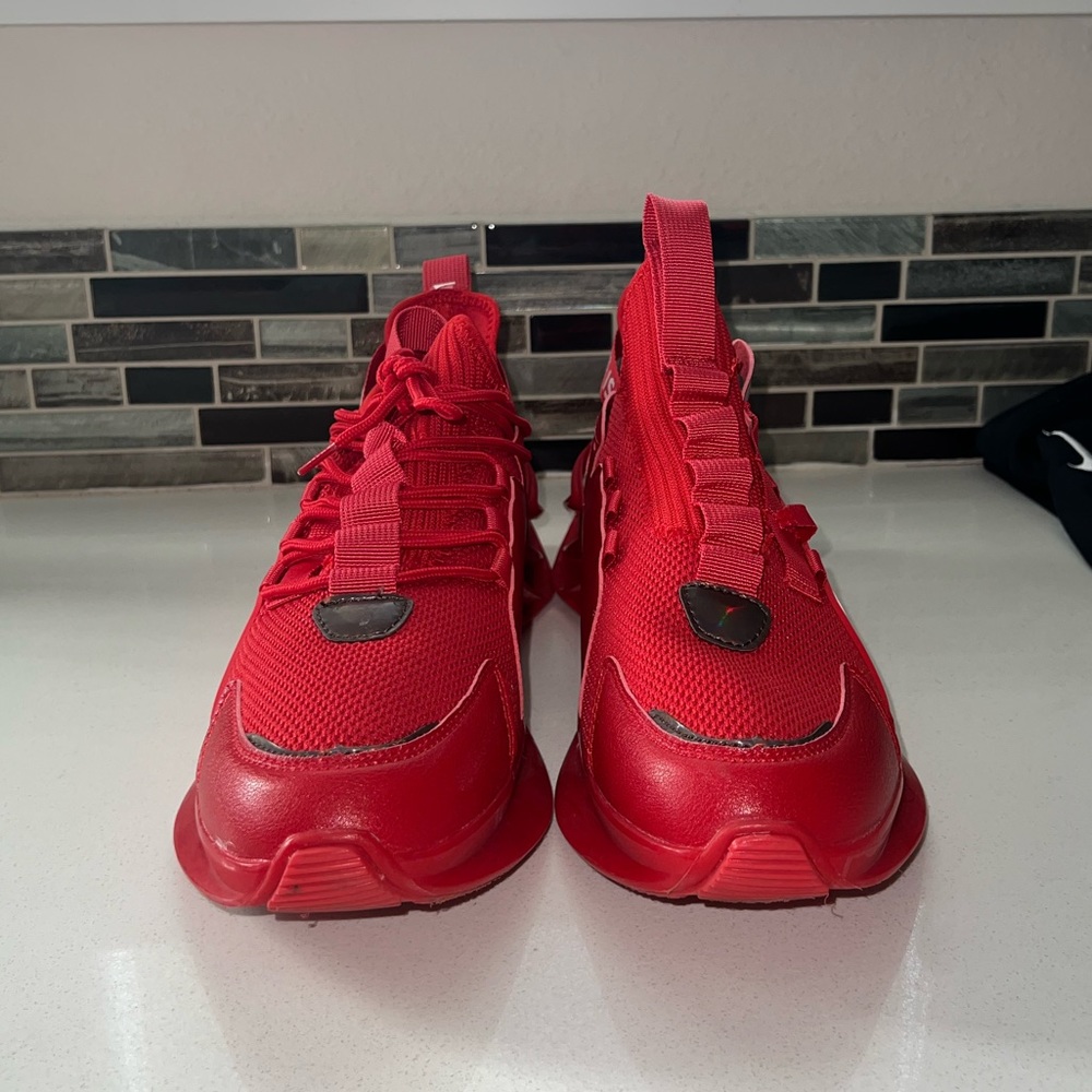 Red athletic sneakers